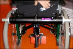 Photo du la motorisation Minotor installé sur un fauteuil x